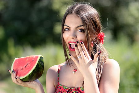 woman holding watermelon fruit thumbnail