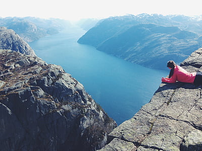 woman near body of water at daytime thumbnail
