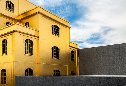 yellow painted building thumbnail