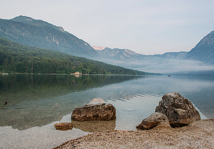 landscape photography of river and mountain thumbnail