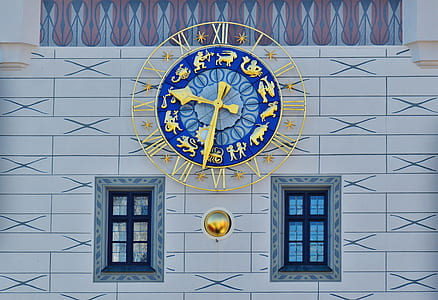 round gold framed analog wall clock at 9:32 thumbnail