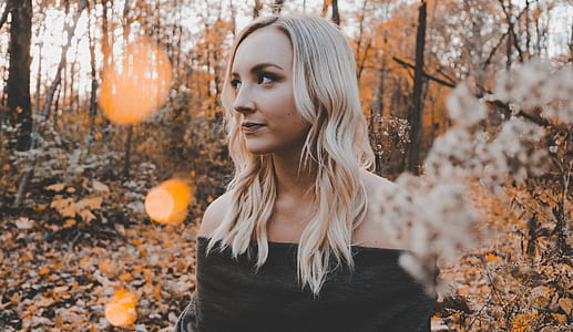woman taking picture on forest thumbnail