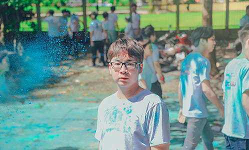 Man Wearing Blue Crew-neck Shirt Near People thumbnail