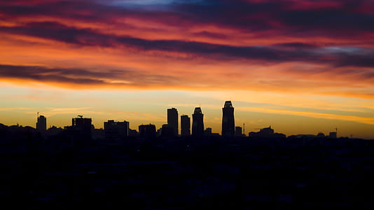 silhouette of city during sunset thumbnail