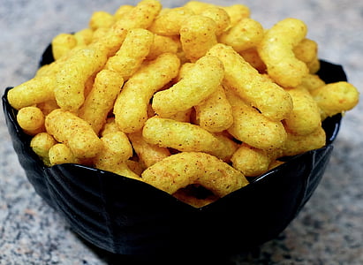 selective focus photography of cooked puff food in round black ceramic bowl thumbnail