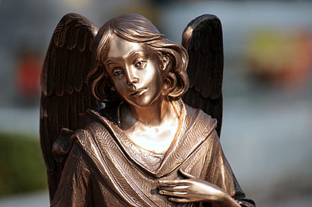 brass angel statuette thumbnail