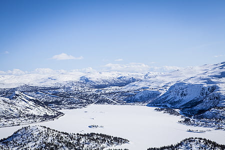 high-angle photography of snowfield and mountains thumbnail