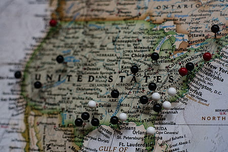 closeup photo of pinned United States of America map thumbnail