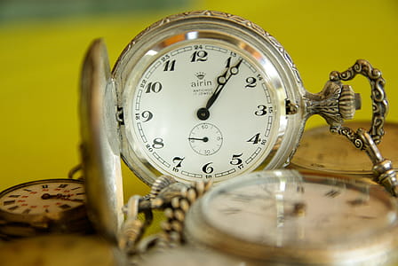 Silver-colored Pocket Watch at 1 thumbnail