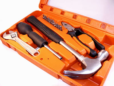 black handled claw hammer on orange case thumbnail
