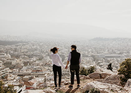 man and woman holding hands thumbnail