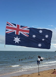 flag of Australia near the beach at daytime thumbnail