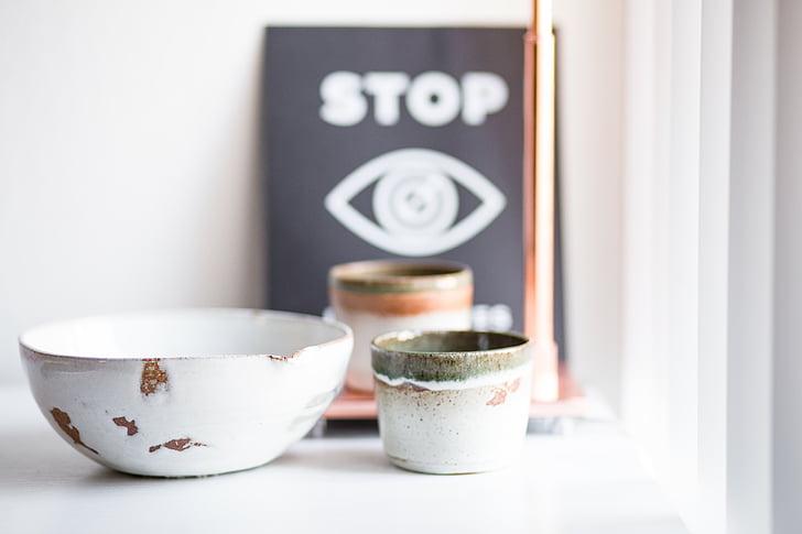round white and brown ceramic bowl on white surface