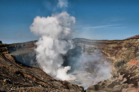 volcanic crater spews white smoke thumbnail