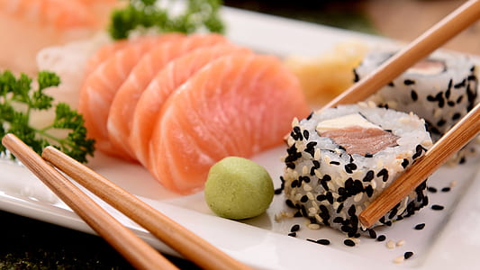 sushi with sashimi on white ceramic plate thumbnail