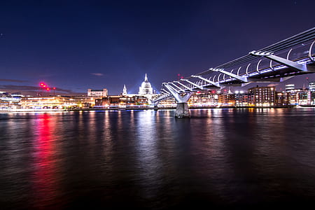 white bridge near city during nighttime thumbnail