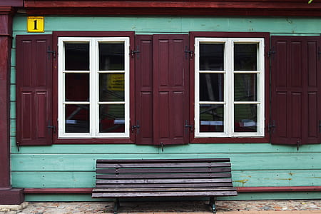 closed purple and gray wooden house window thumbnail