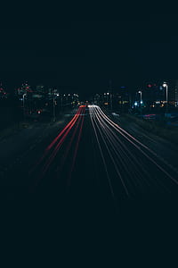 time lapse photo of highway during nighttime thumbnail