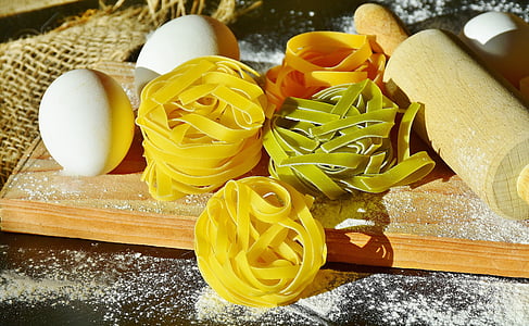 flat pasta on board beside pinm thumbnail