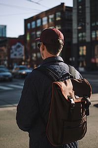 brown and black backpack thumbnail