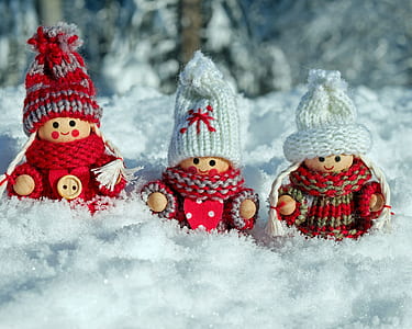 three mini figures on snow thumbnail