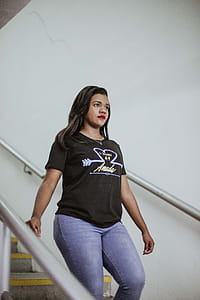 Photo of Woman Walking Down a Flight of Stairs thumbnail