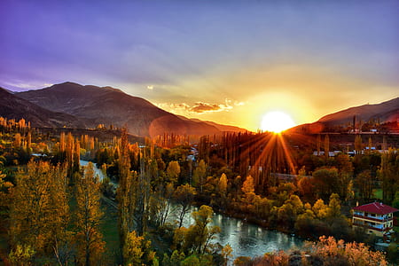 sunrise behind mountain thumbnail