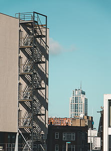 brown concrete building at daytime thumbnail