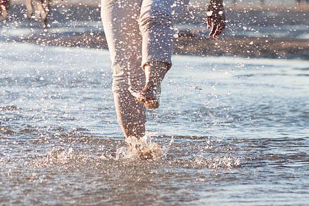 person standing in body of water thumbnail