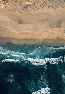 aerial view of seashore during day time thumbnail