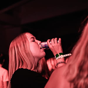 Woman Drinking From Can thumbnail