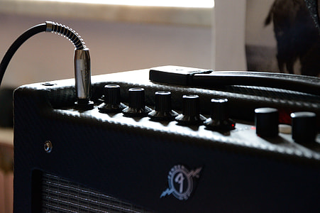 shallow focus of black guitar amplifier thumbnail