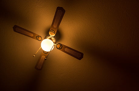brown 4-blade ceiling fan with lamp hanging on ceiling thumbnail