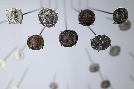 closeup photo of seven assorted-denomination coins thumbnail