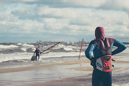 man standing in front of sea thumbnail