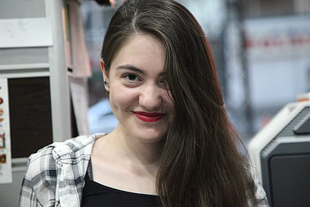 smiling woman with red lipstick thumbnail
