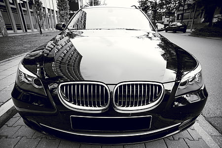 black BMW car on concrete ground thumbnail