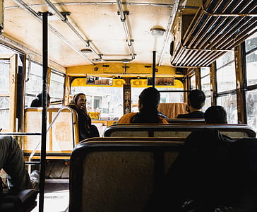 people inside bus at daytime thumbnail