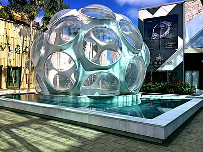 Grey Sphere With Round Holes Tourist Attraction thumbnail