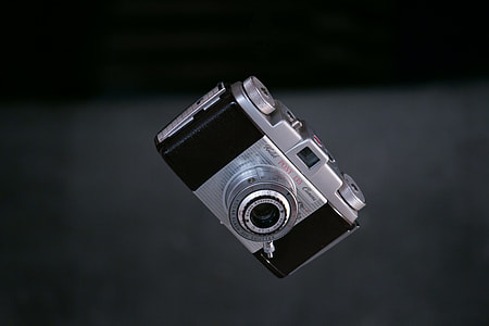 shallow focus photography of silver and black mirrorless camera thumbnail
