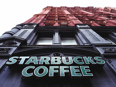 low angle photography of black Starbucks Coffee store thumbnail