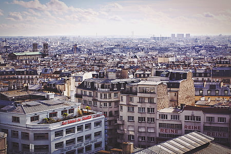 white and brown city building at daytime thumbnail