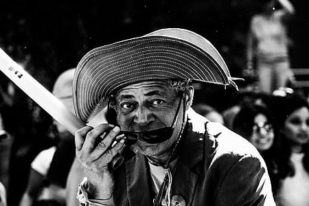Grayscale Photography of Man in Hat thumbnail
