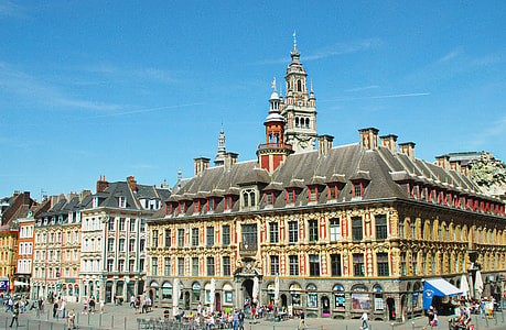 group of people standing near building thumbnail