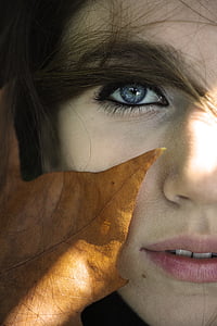photo of dried leaf on woman's face thumbnail