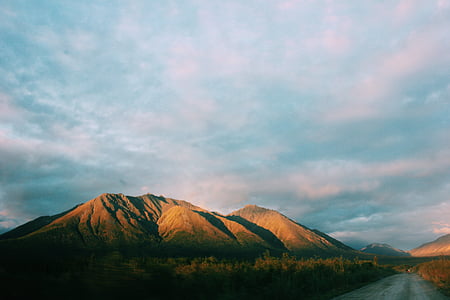landscape photography of brown mountains thumbnail