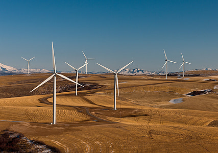 white wind turbine farm on field thumbnail