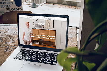 MacBook Pro on brown wooden surface thumbnail