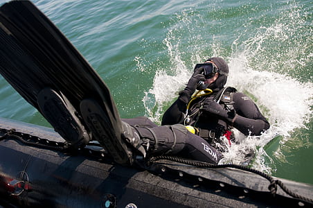 person diving in sea thumbnail