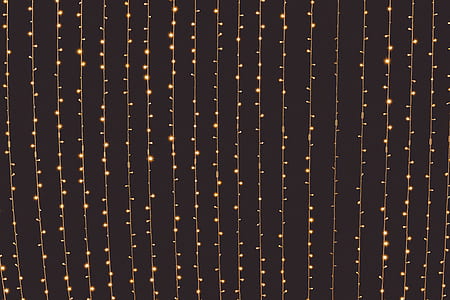 line of orange Christmas lights thumbnail